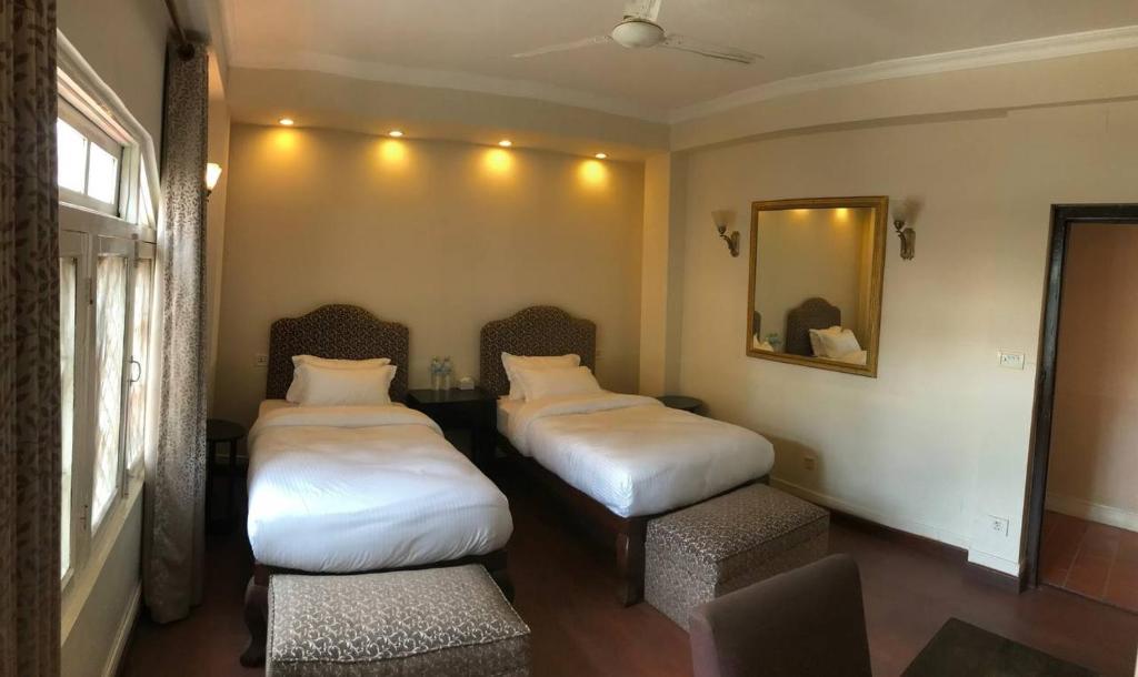 Twin Beds · Comfortable Stay · Practical Choice